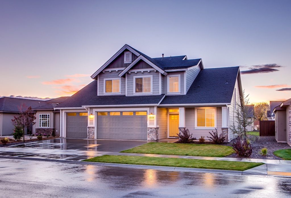 blue grey house in the evening after a rainstorm, summer safety tips